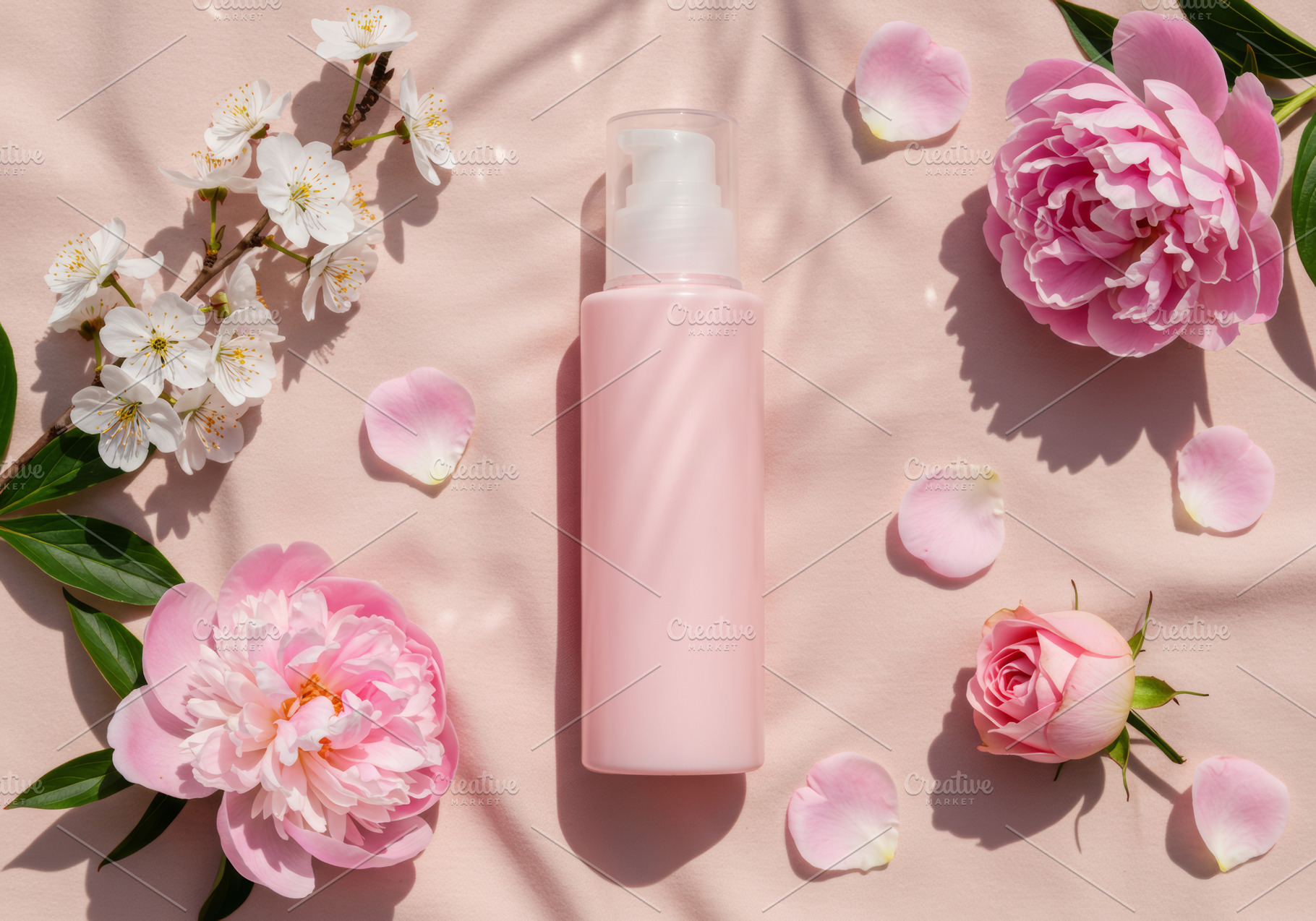 Pink cosmetic pump bottle with flowe, a Beauty & Fashion Photo by professorinc
