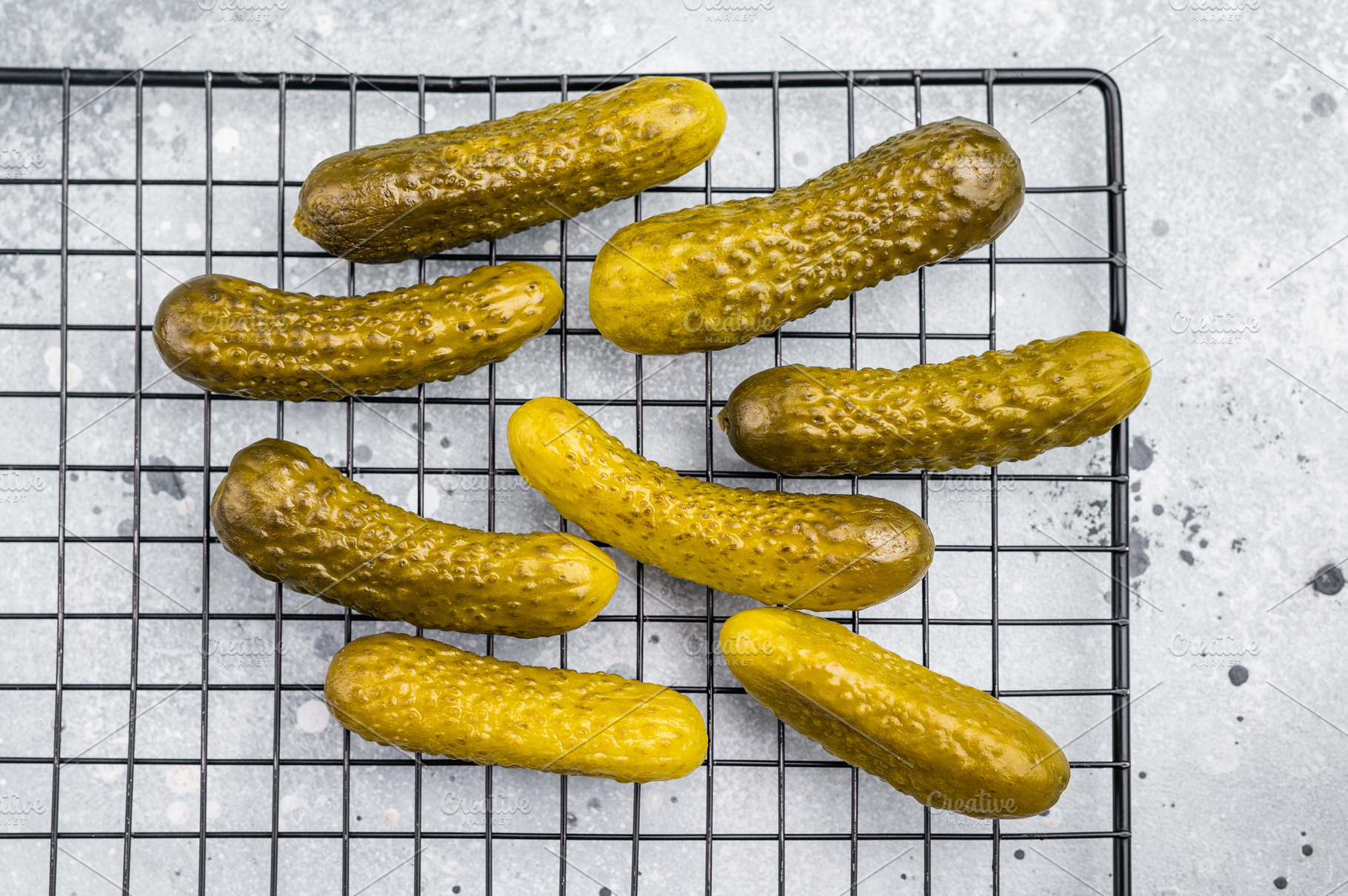 Crunchy pickled cucumbers, bursting with flavor, perfect for san, a Food & Drink Photo by composter-box@mail.ru