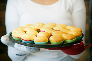 Woman Baking Fresh Cupcakes At Home, a Photo by THP Creative