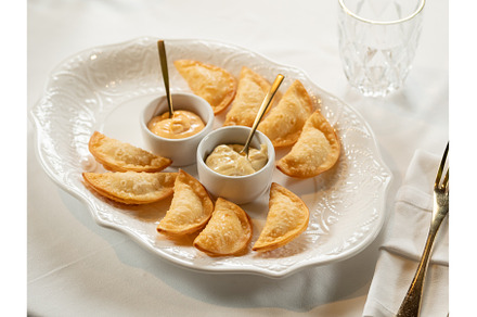 Mini Chebureki with sauces on white, a Food & Drink Photo by Fascinadora