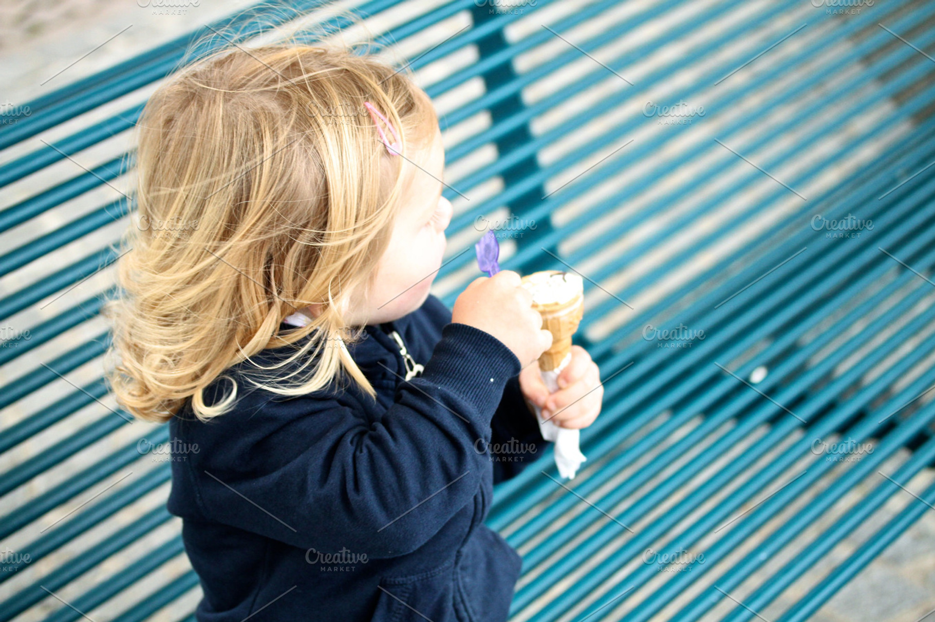 Girl eating an ice cream containing summer, girl, and ice