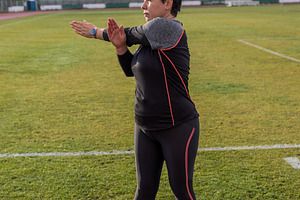 Middle aged woman stretching arms, a Photo by Grafvision photography