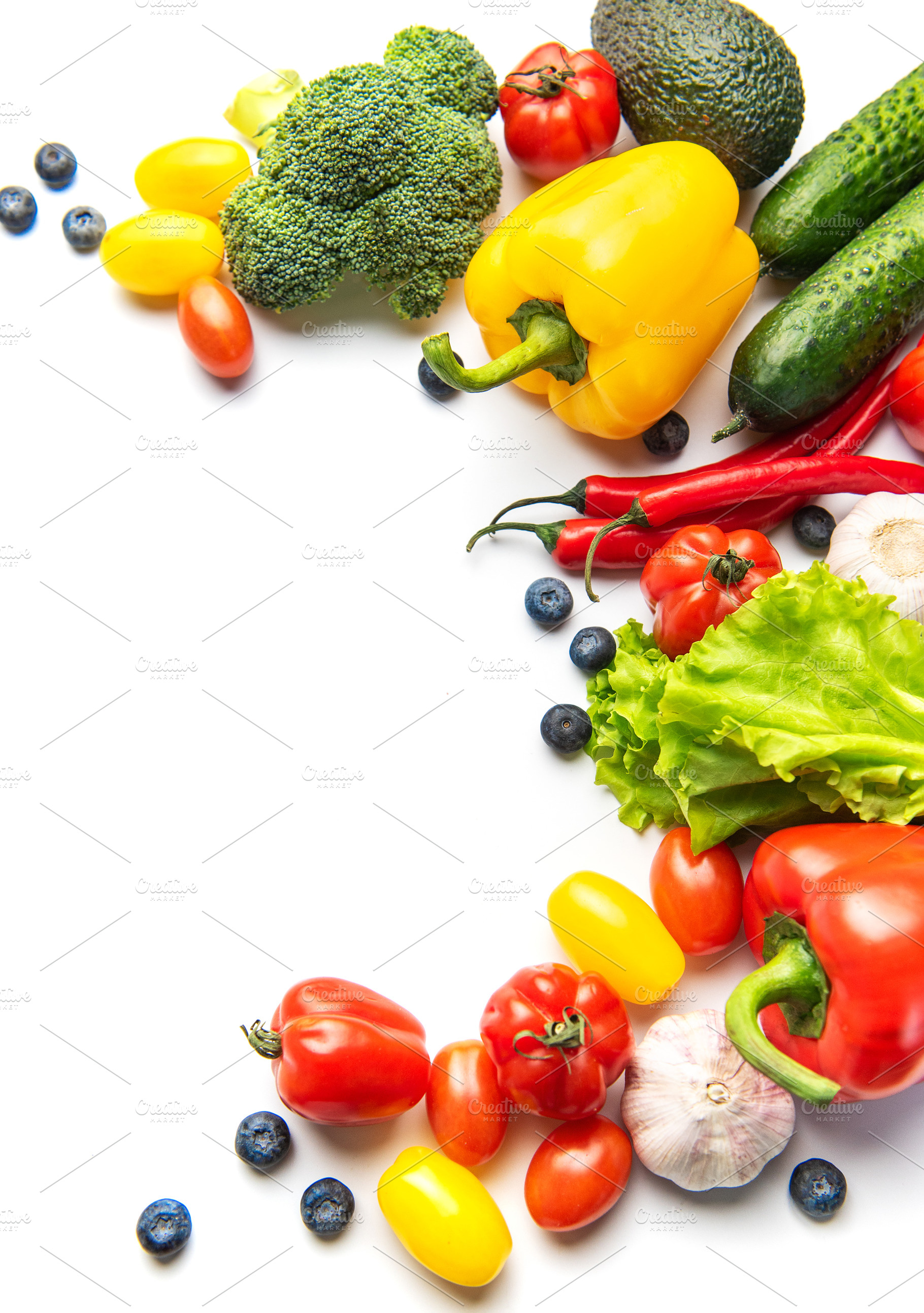 Fresh vegetables and fruits creating healthy eating border, a Food & Drink Photo by Olena Rudo