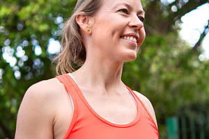 Smiling mature woman enjoying outdoor fitness activity in park, a Person Photo by etorres69
