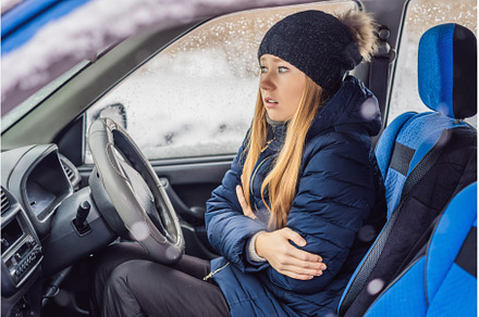 Woman in a car during a snowfall, a Transportation Photo by Elizaveta Galitskaya