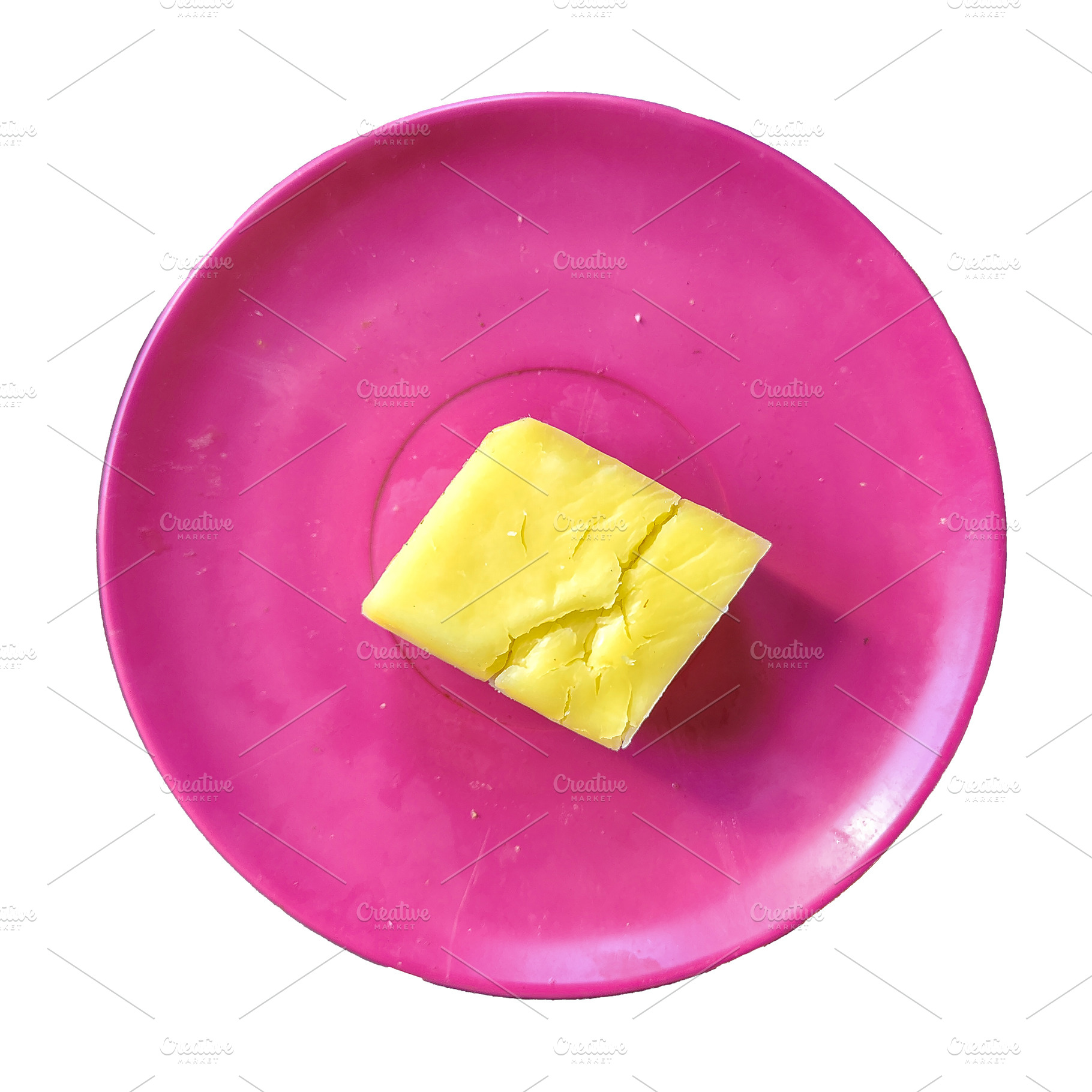 Piece of low-fat cheese placed on a red plastic plate isolated p, a Food & Drink Photo by DanFLCreativo