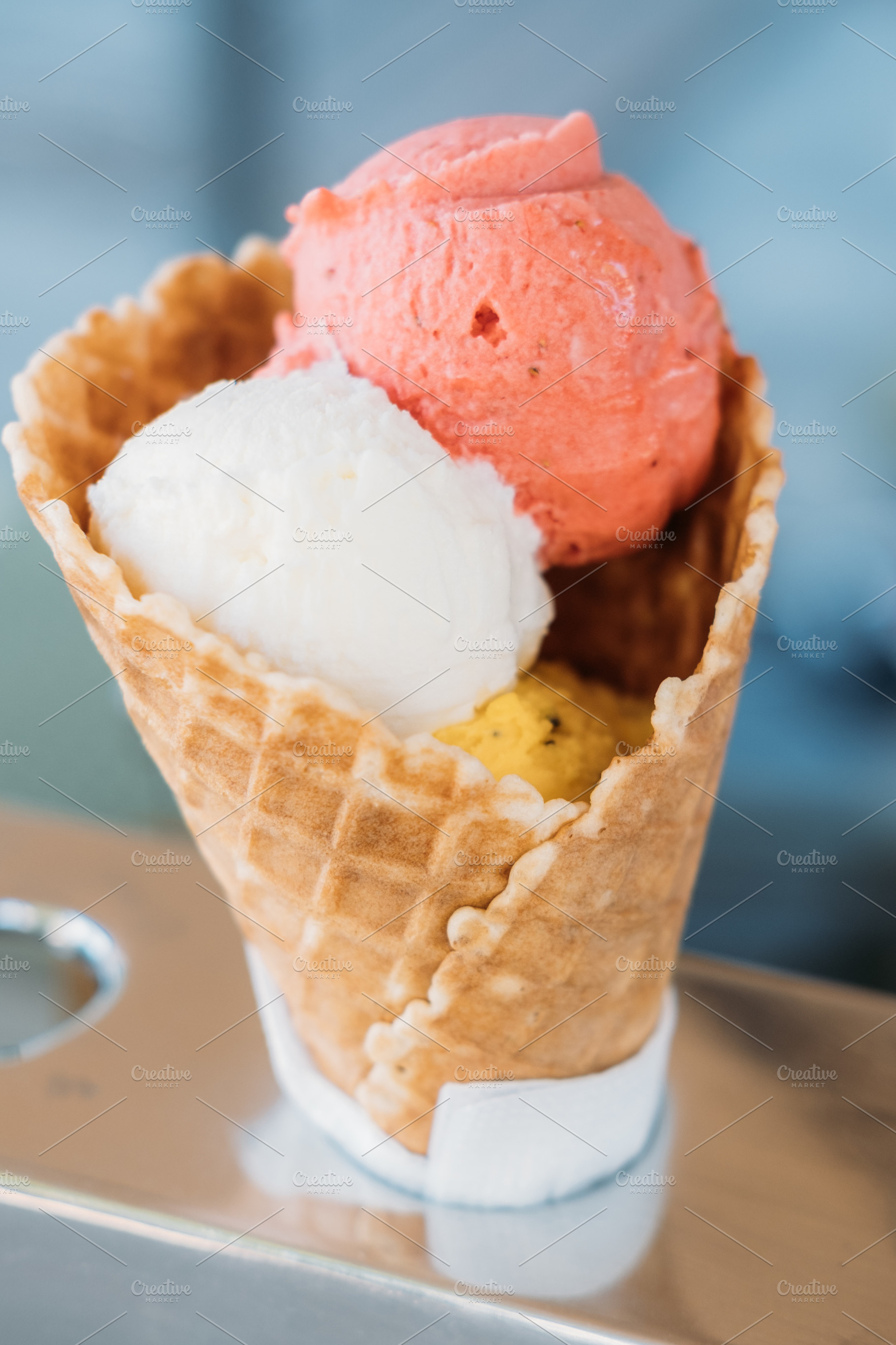 Cold dessert fruit scoop gelato waffle ice cream, a Food & Drink Photo by Photo Drive Studio