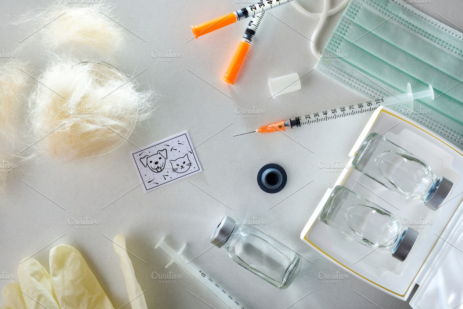 Pet dandruff and hair vaccination tools on white hospital table, a Health & Medical Photo by Davizro's Market