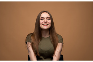 Young woman smiling portrait looking, a Person Photo by volodymyrshtun13795
