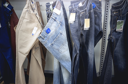 Clothes on clothes rail stock photo containing clothing and clothes