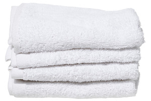 Stack of four folded white terry towels, on isolated background., an Abstract Photo by ndanko