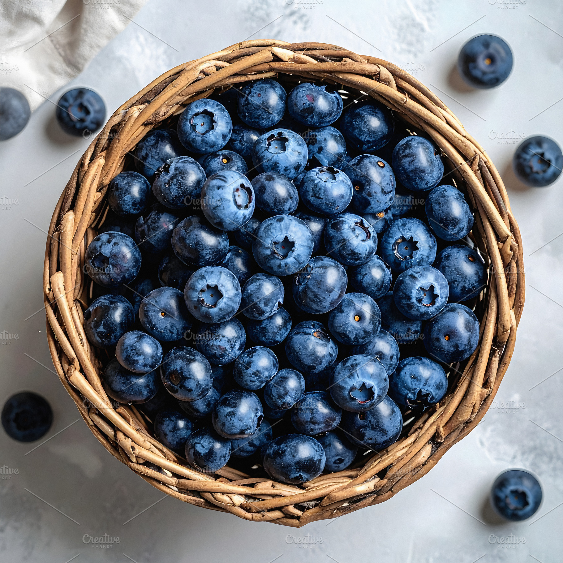 Fresh blueberries in wicker basket viewed from above, a Food & Drink Photo by GoodGoods