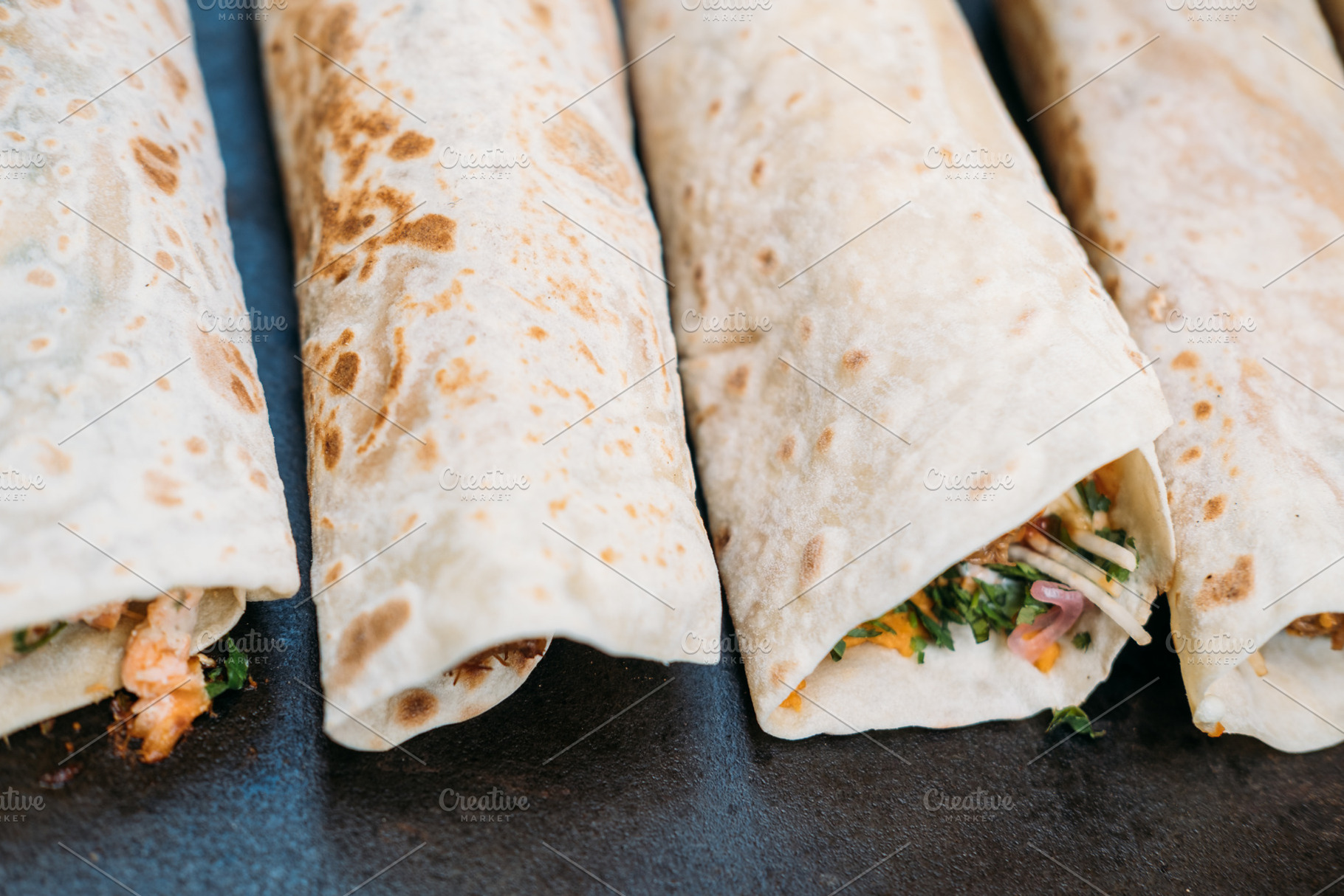 Tortilla roll burrito set traditional fast meal, a Food & Drink Photo by Photo Drive Studio