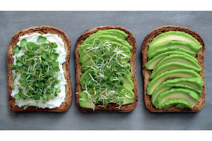 Assorted toasts topped with avocado, a Food & Drink Photo by ZinetroN