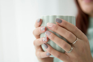 Woman's hands holding a cup of mint featuring mug, cup, and mint