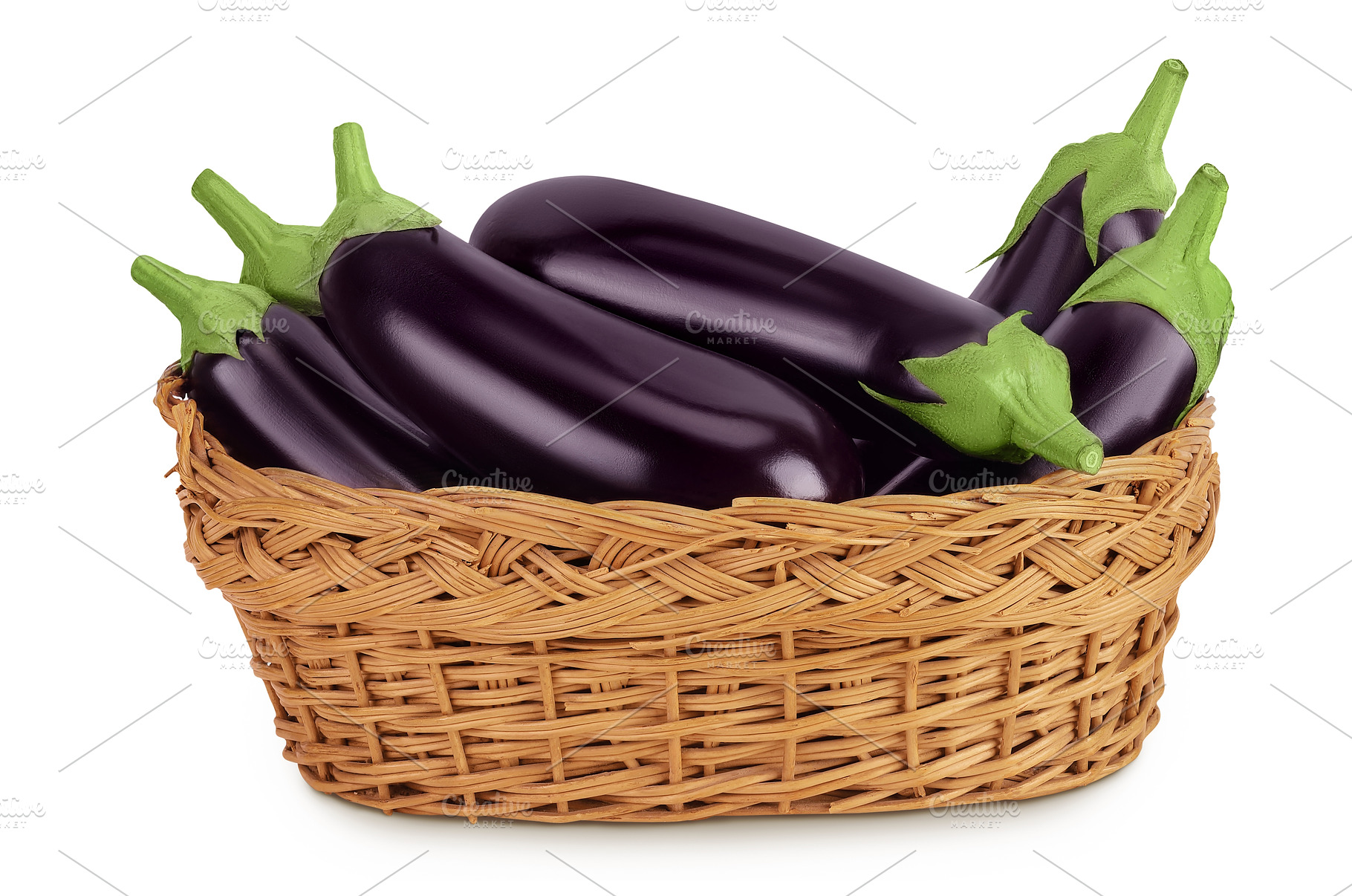 eggplant in a wicker basket isolated, a Food & Drink Photo by NataPhoto