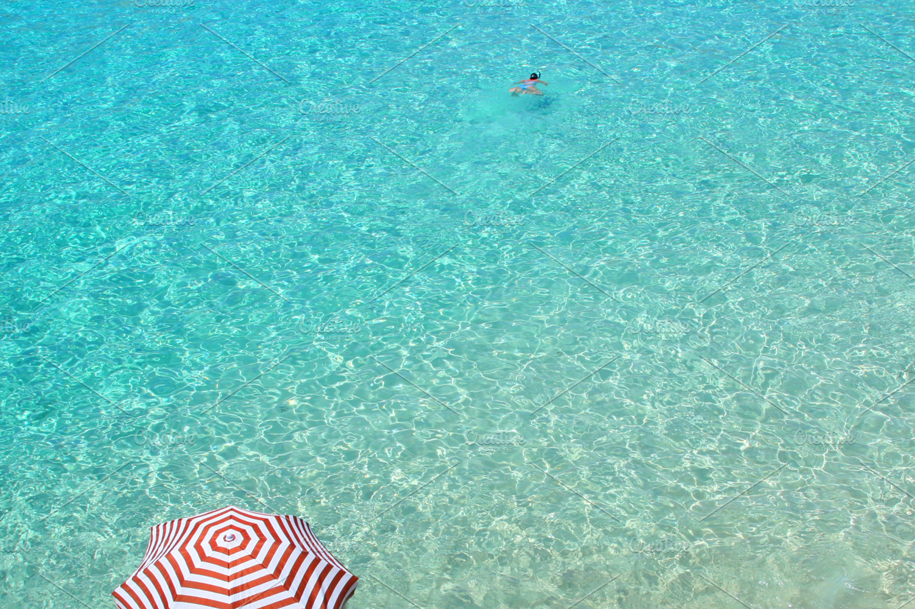 Transparent water in a beach, a Nature Photo by aagafapaperiapunta