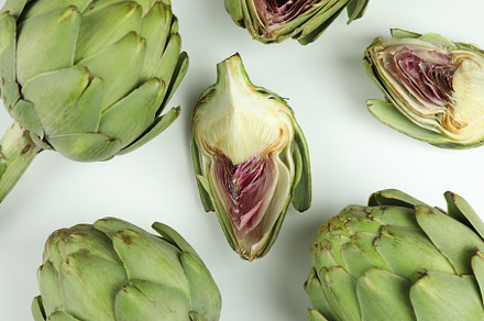 Concept of healthy food with artichoke on white background, a Food & Drink Photo by AtlasStudio