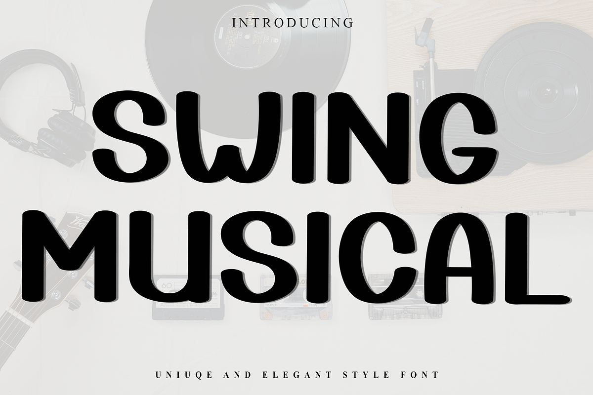 Swing Musical, a Script Font by InermediaSTUDIO (Photo 1 of 8)