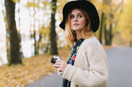 Hippie girl with old camera featuring autumn, girl, and park, a Person Photo by Cherkas Photography