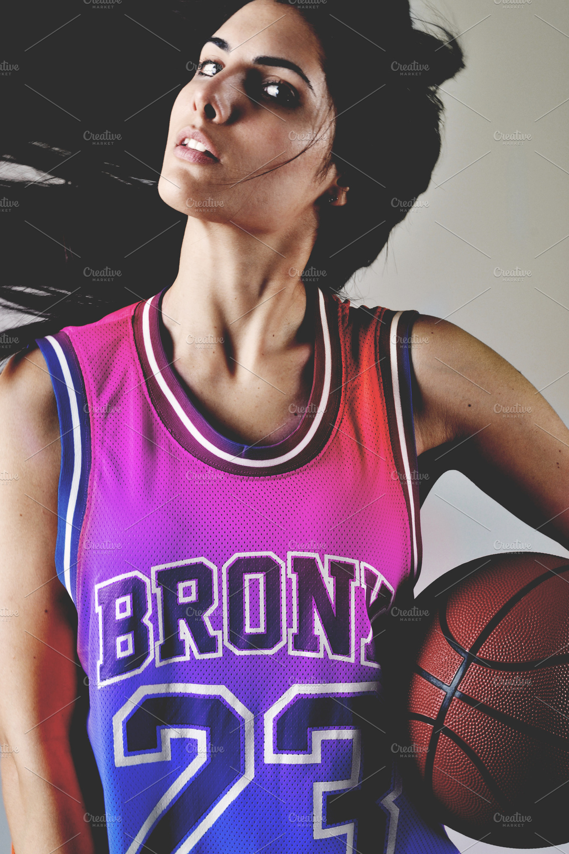 Beautiful woman with the basketball