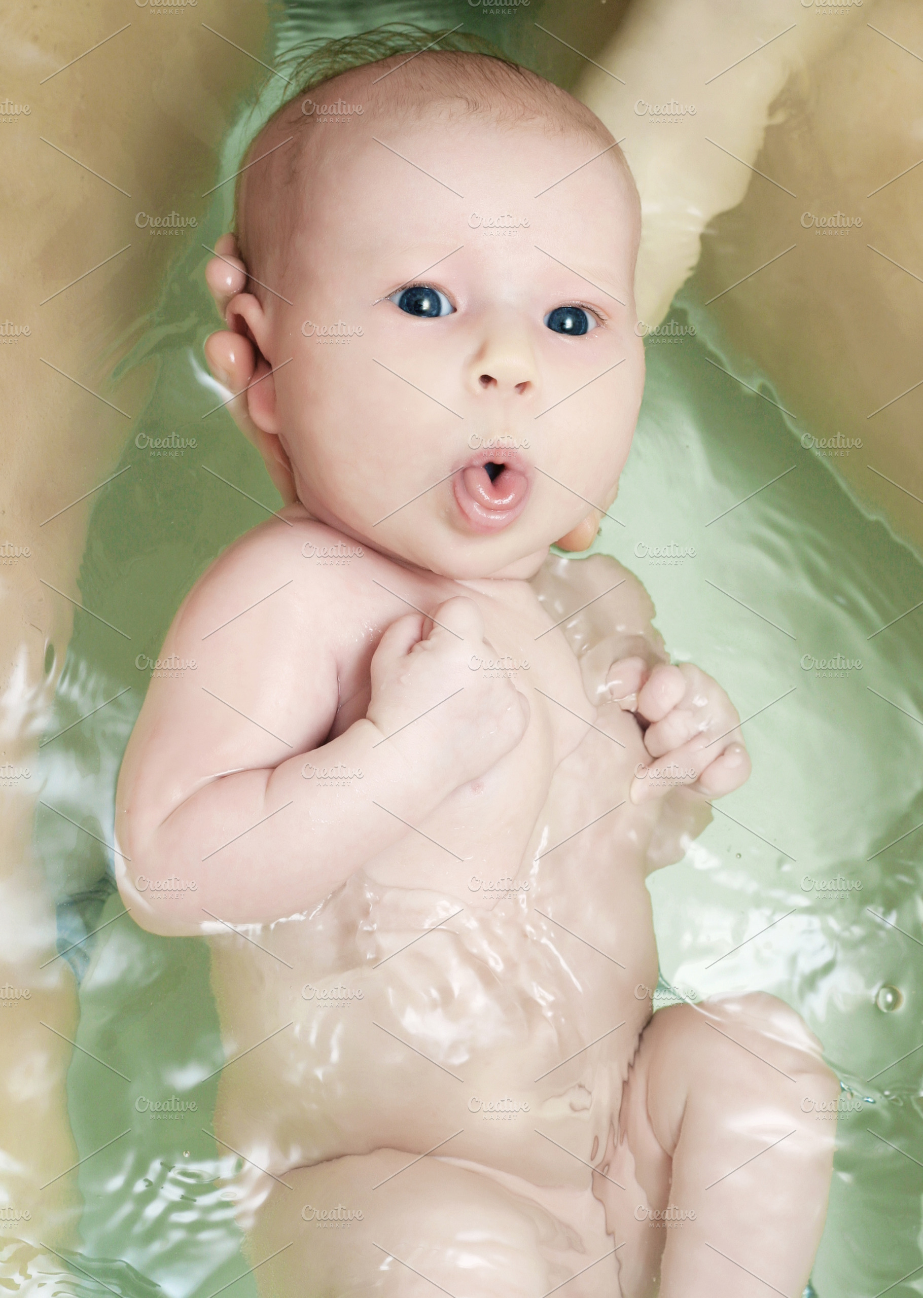Newborn baby swim, a Photo by saiko3p