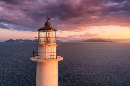 Lighthouse on the mountain peak at, a Nature Photo by den-belitsky