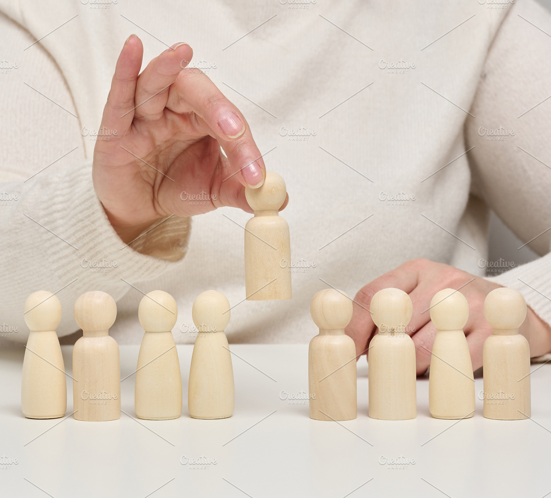 Conceptual photo of a recruitment process, a person's hand picki, a Business Photo by ndanko