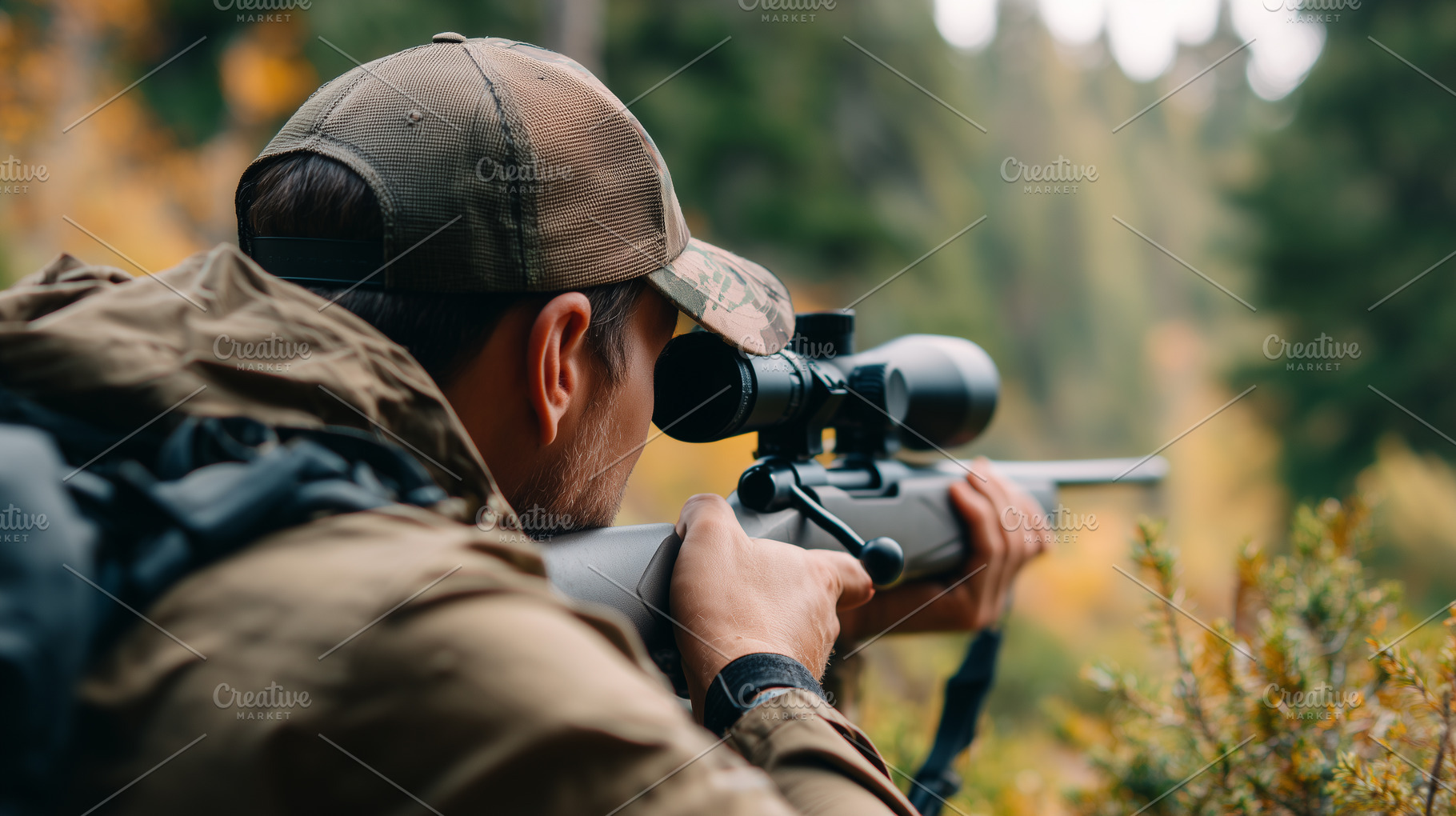Focused hunter aiming a scoped rifle, a Sports & Recreation Photo by MistyDay