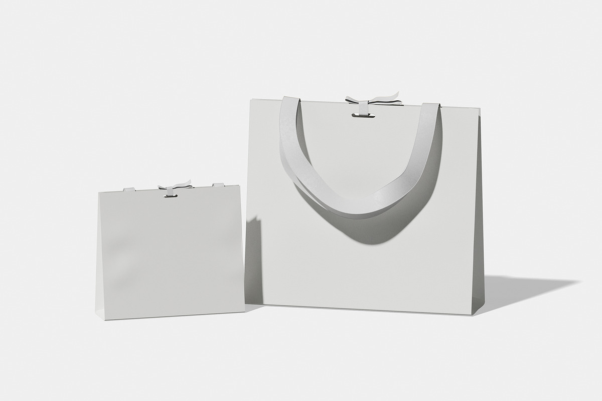Shopping Bag with Ribbon Mockup, a Merchandise Mockup by Unerispace (Photo 5 of 5)