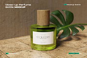 Close-Up Perfume Bottle Mockup, a Packaging Mockup by My Code Std (Thumbnail 1 of 3)