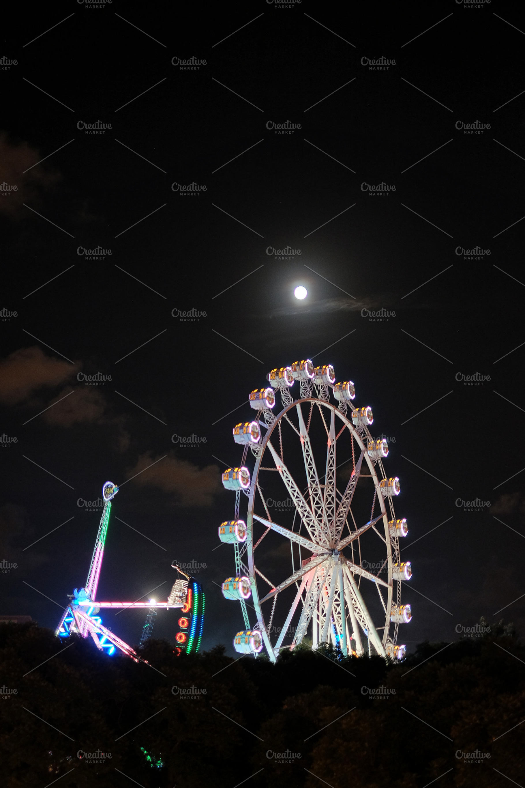 Ferris wheel with full moon, an Arts & Entertainment Photo by Kynamuia