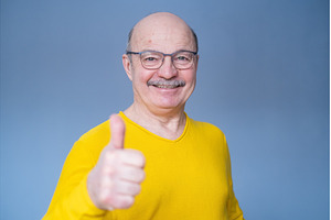 Senior man thumbs up isolated over