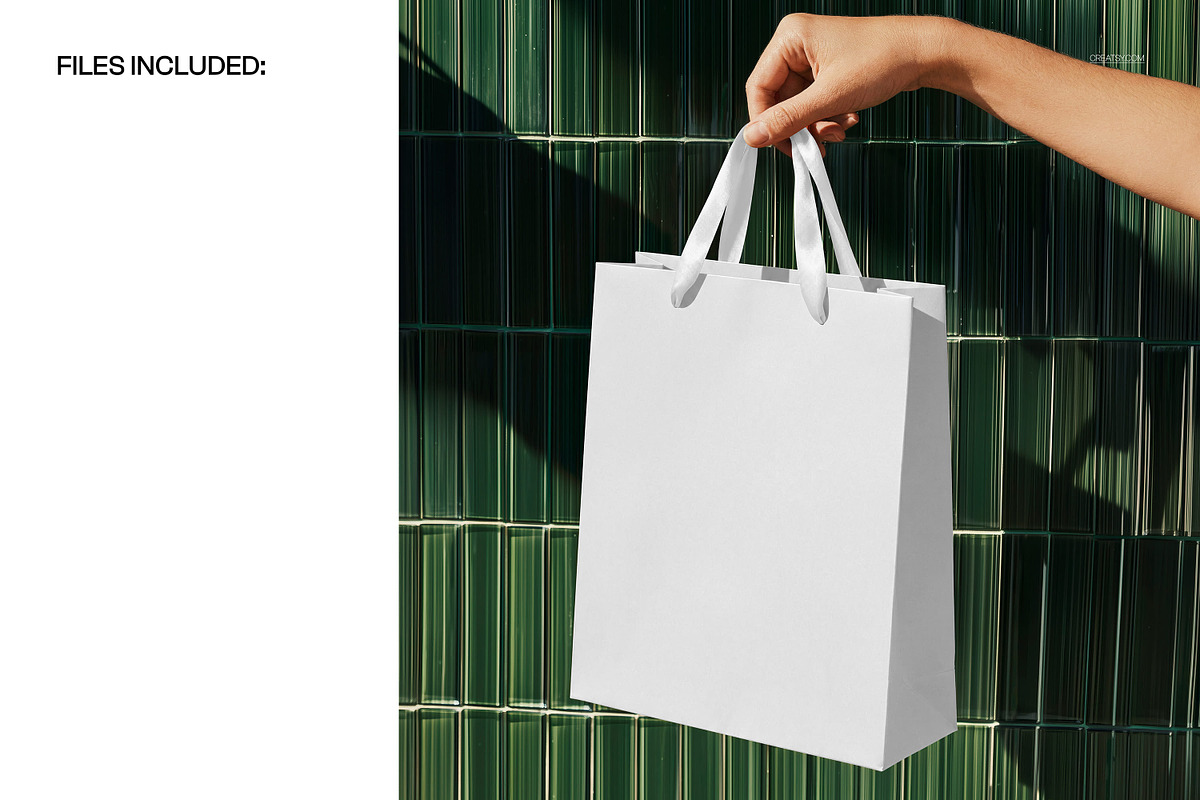 Shopping Bag in Hand Mockup, a Packaging Mockup by creatsy5 (Photo 2 of 5)