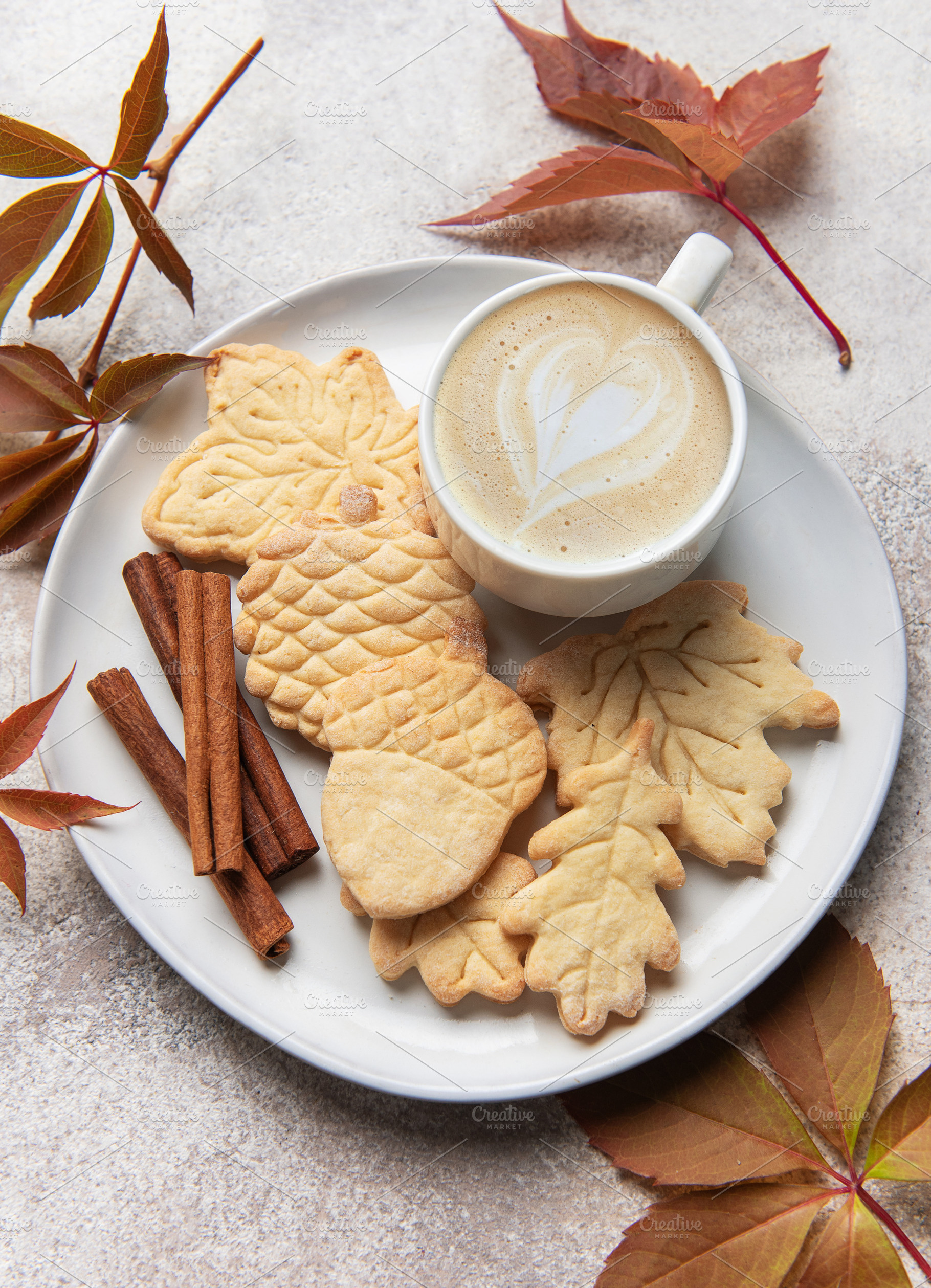 Autumn cookies and coffee with cinnamon sticks, a Food & Drink Photo by Olena Rudo