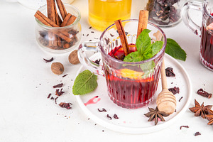Tasty autumn non-alcohol hibiscus mulled wine drink, a Food & Drink Photo by Rimma