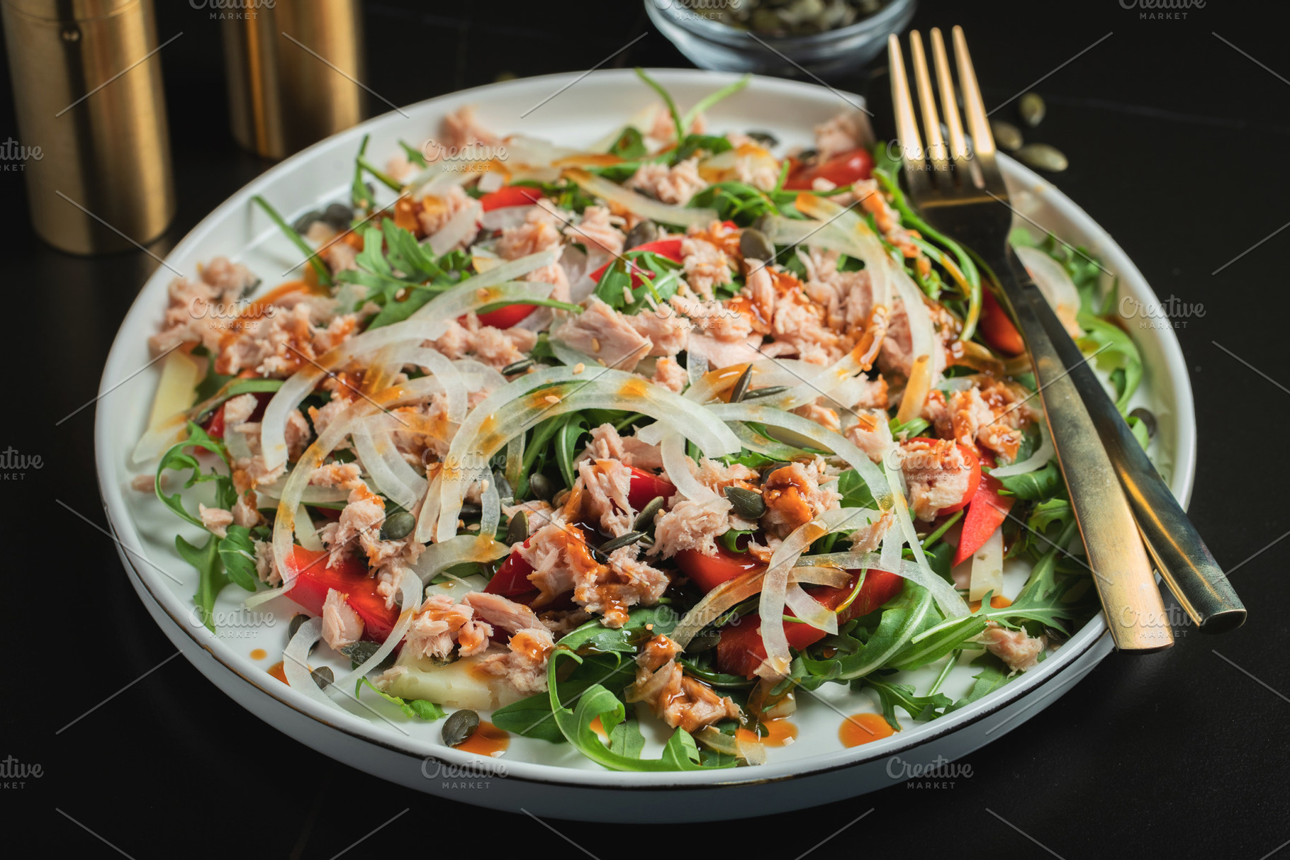 Fresh Tuna Salad with Onions and Cherry Tomatoes. Italian Mediterranean Cuisine, a Food & Drink Photo by Budarinphoto