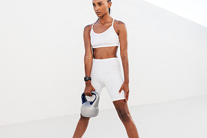 Slim woman in white fitness clothes, a Sports & Recreation Photo by Artem Varnitsin