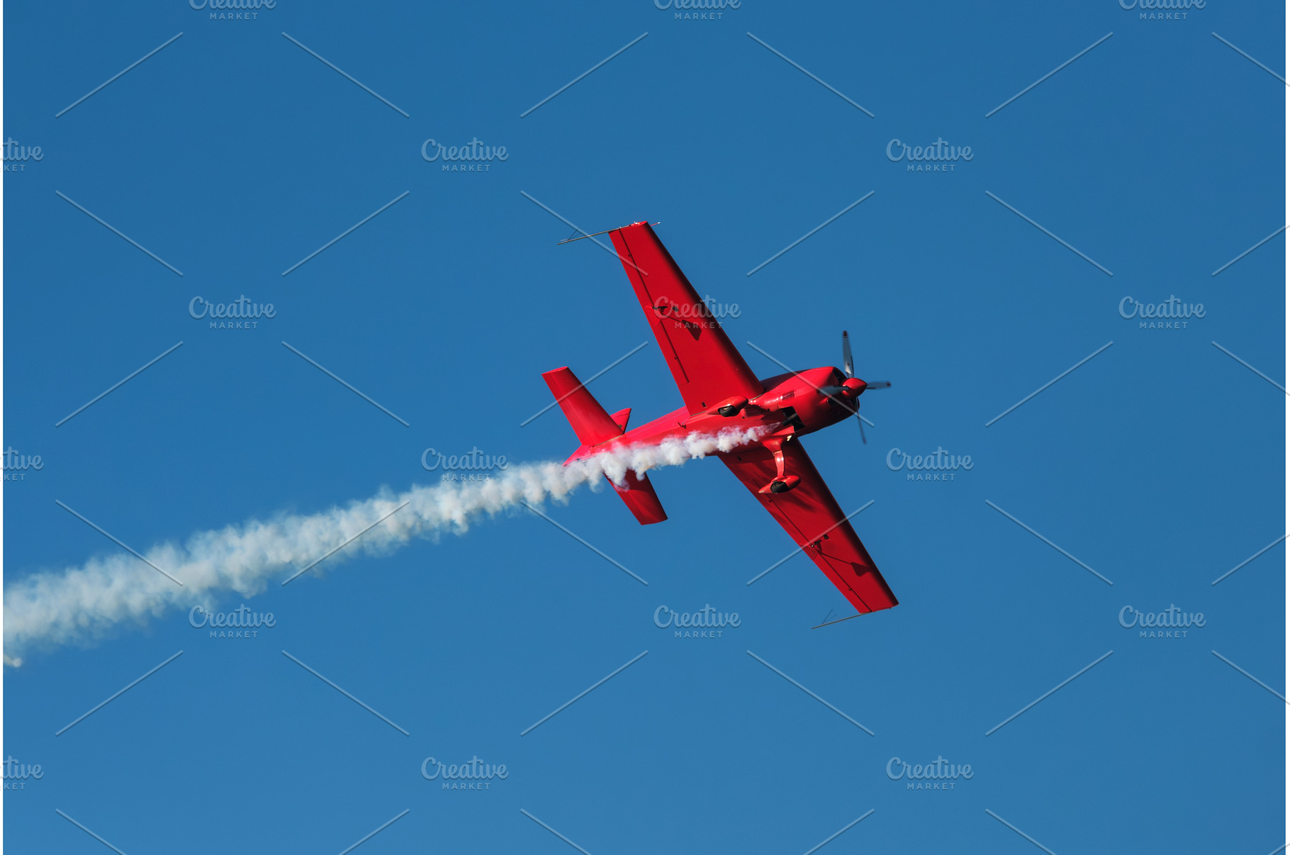 Stunt aerobatic plane performing, a Nature Photo by f9photos