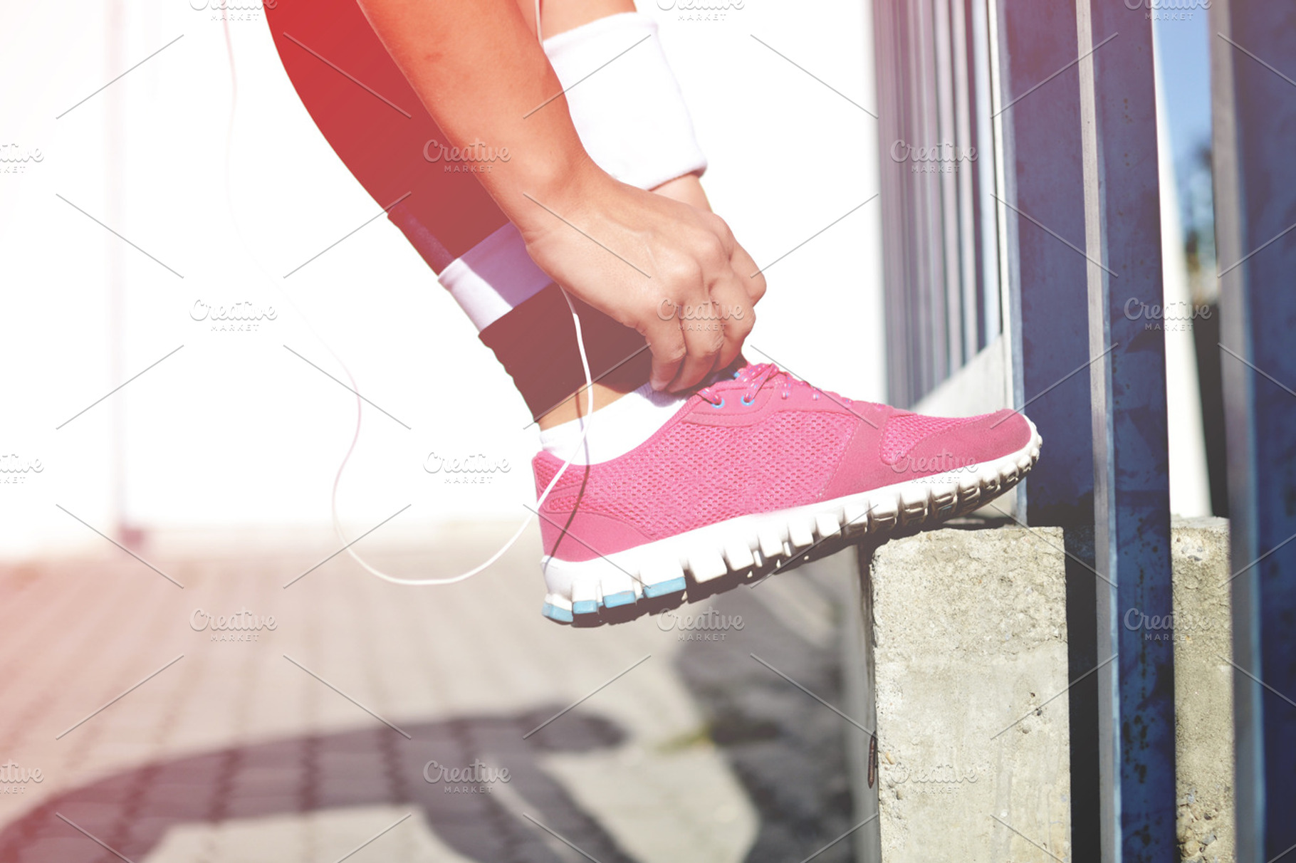 Getting ready for workout containing woman, fitness, and outside