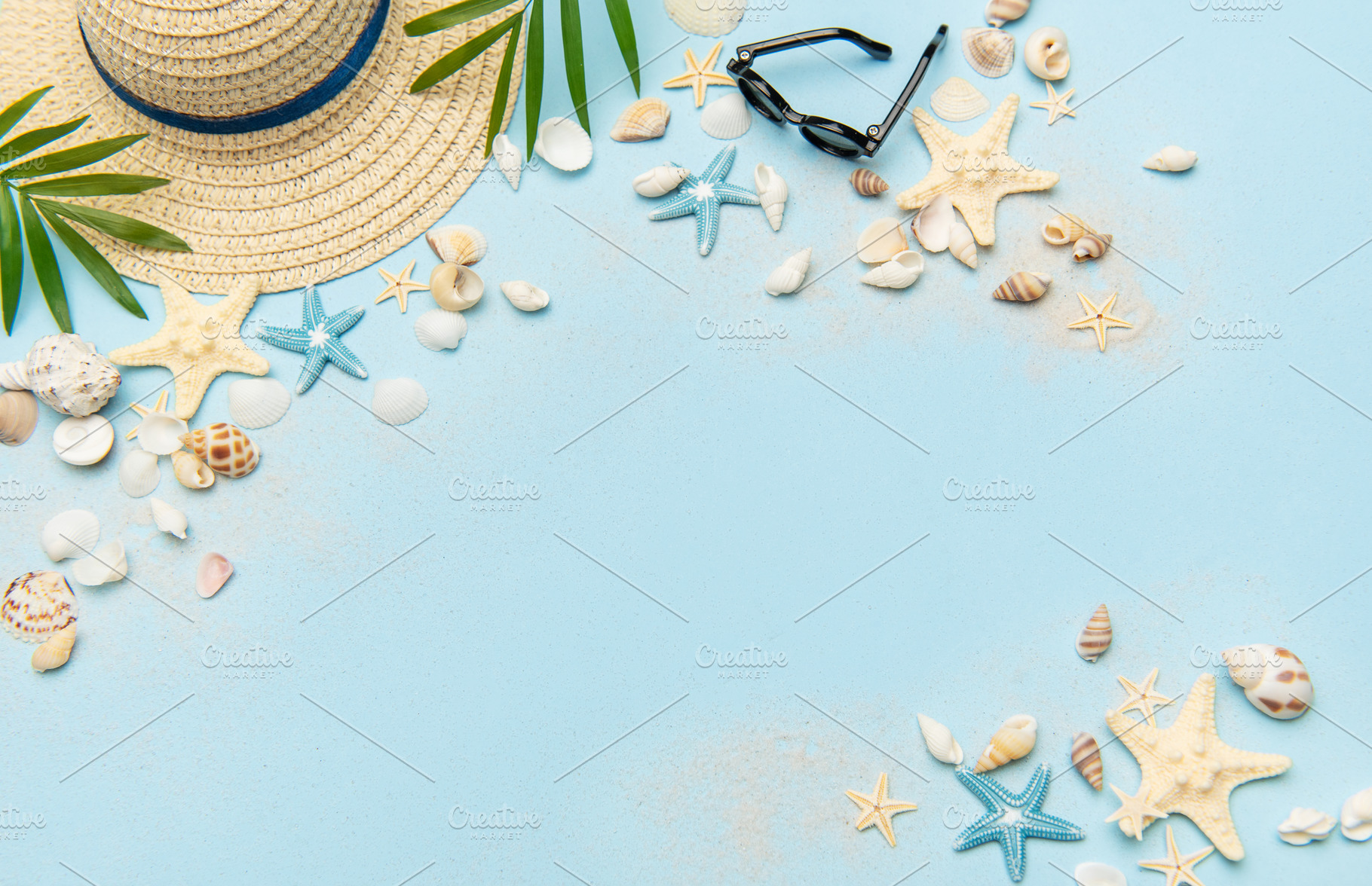 Beach accessories creating a summer holiday background on light, a Holiday Photo by Olena Rudo