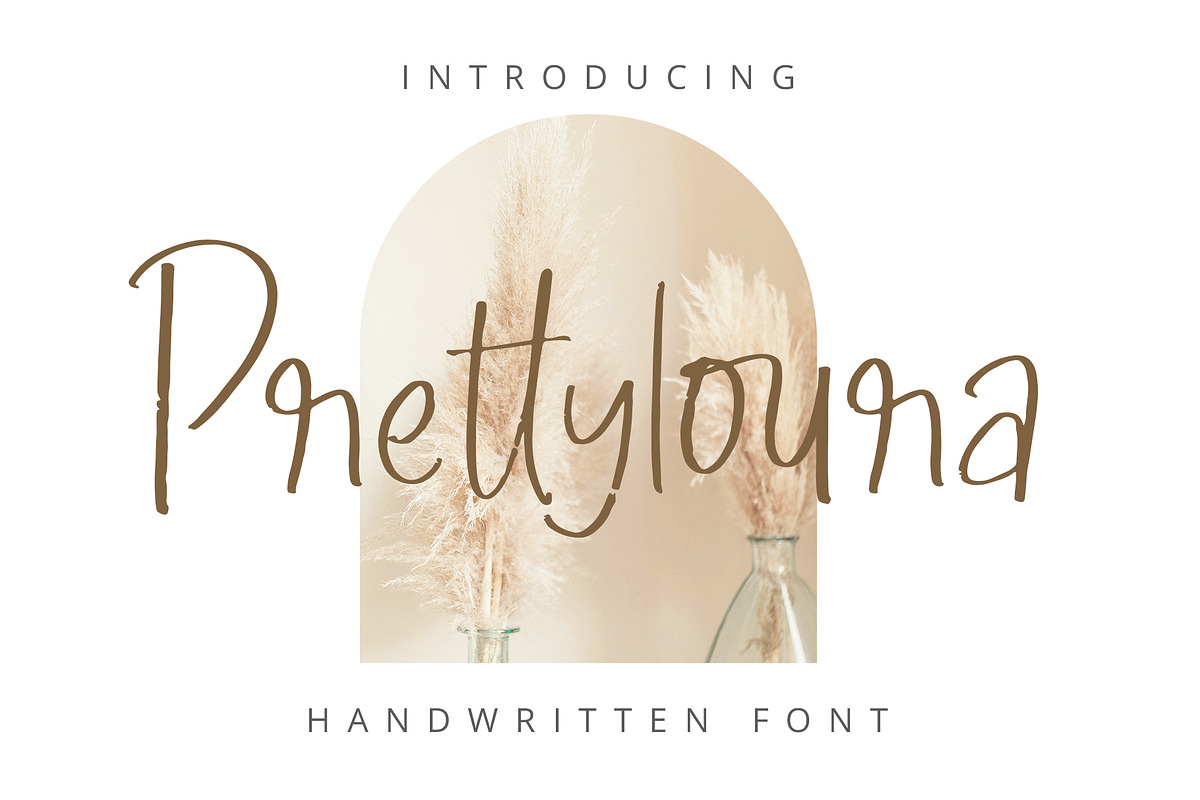 Prettyloura Handwritten Font, a Font by Jaruka (Photo 1 of 6)