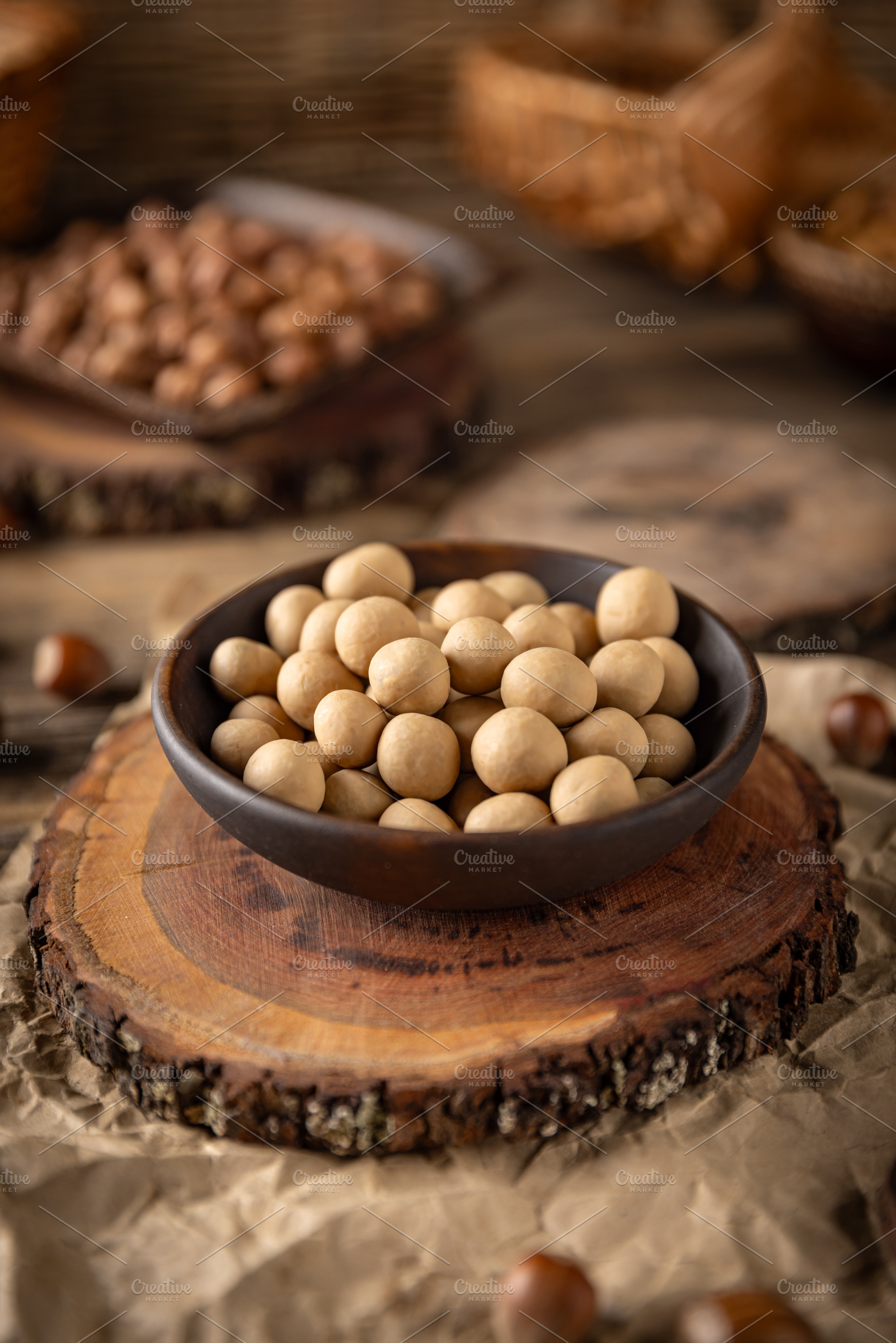 Crunchy roasted hazelnuts coated with white chocolate, a Photo by Grafvision photography