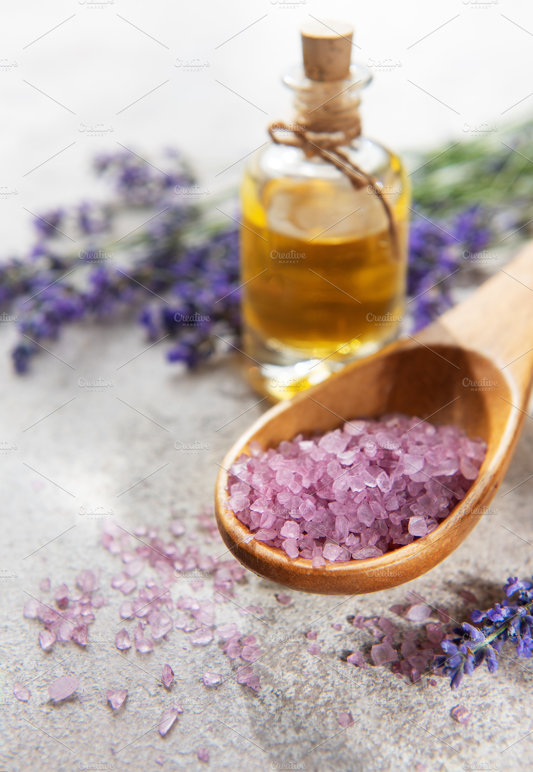 Relaxing spa setting with lavender essential oil and bath salt, a Health & Medical Photo by Olena Rudo