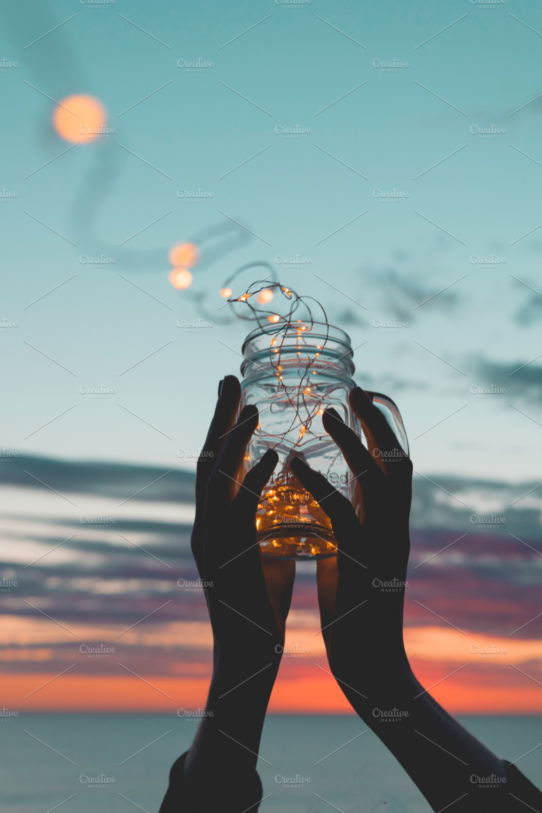 Jar + Lights, a Nature Photo by Fossilized Tree Sap