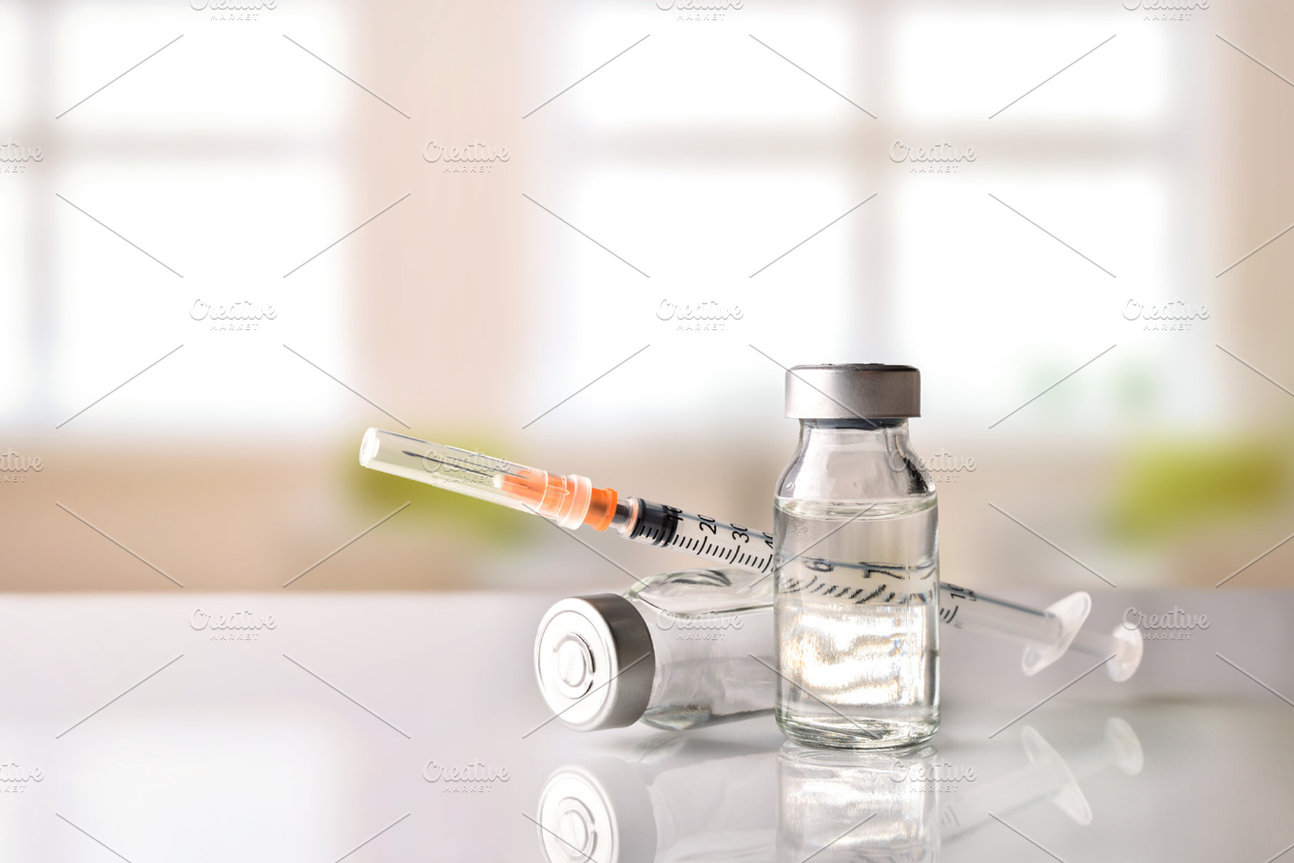 Vials and syringe with windows front, a Health & Medical Photo by Davizro's Market