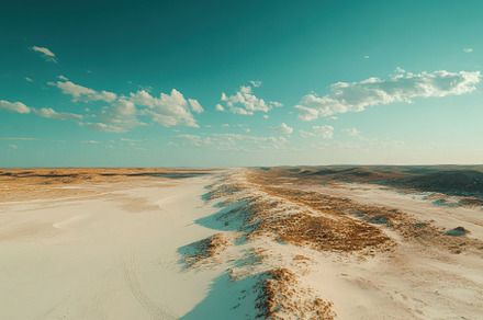 Expansive Sandy Dunes Stretch Across, a Photo by Tanuart