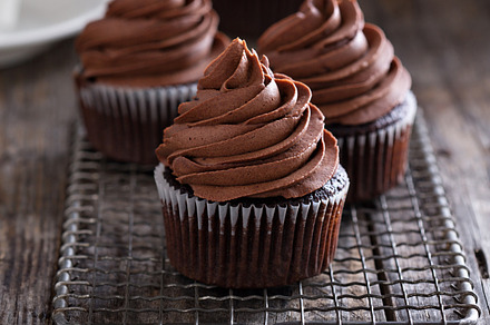 Chocolate cupcakes with whipped ganache featuring chocolate, cupcakes, and, a Food & Drink Photo by farwasser