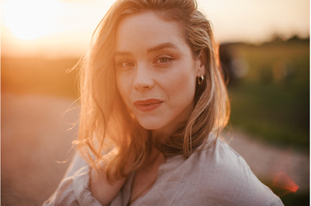 Portrait of young woman walking near, a Nature Photo by HalfPoint