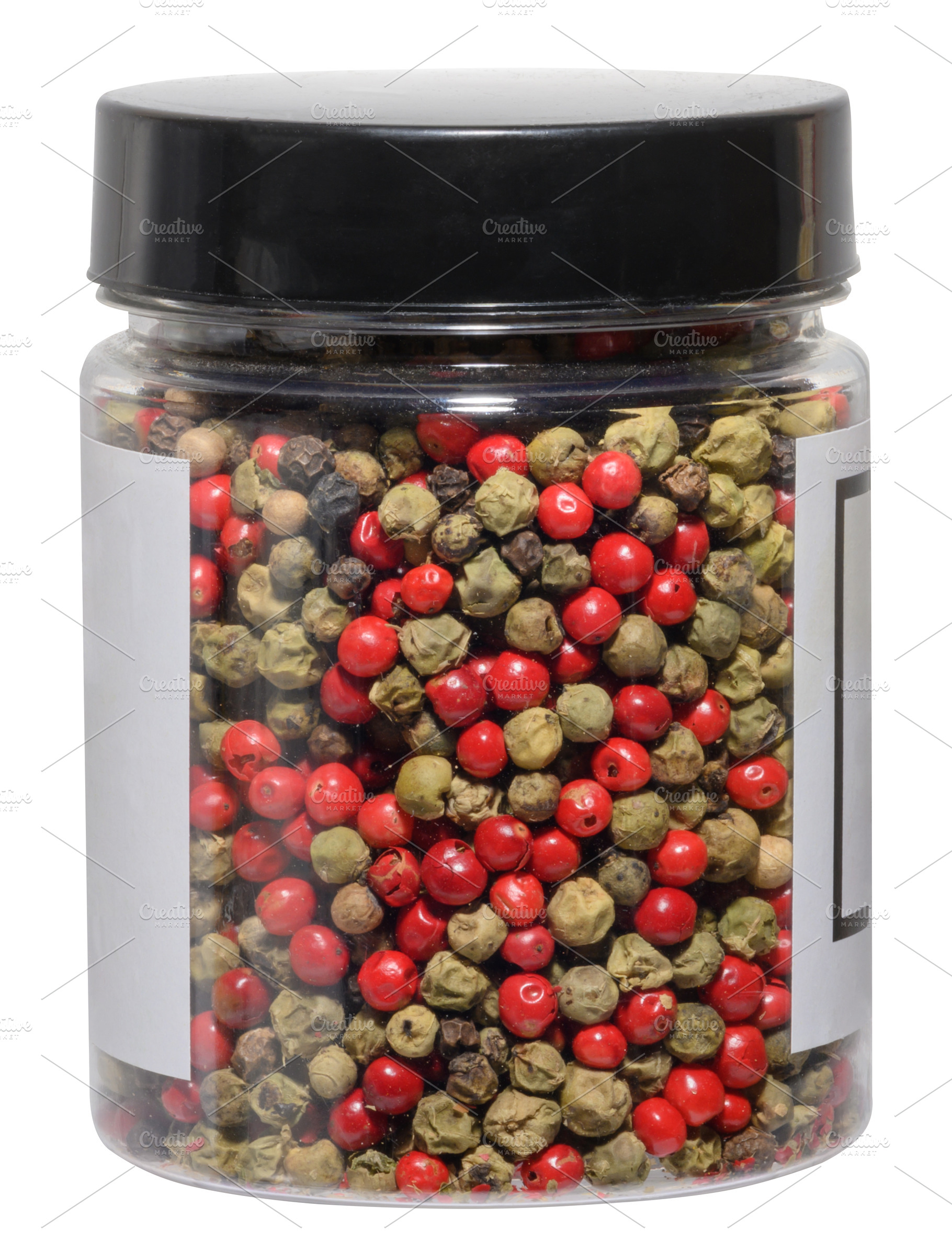 Transparent plastic jar with black lid filled with mixed multico, a Food & Drink Photo by ndanko